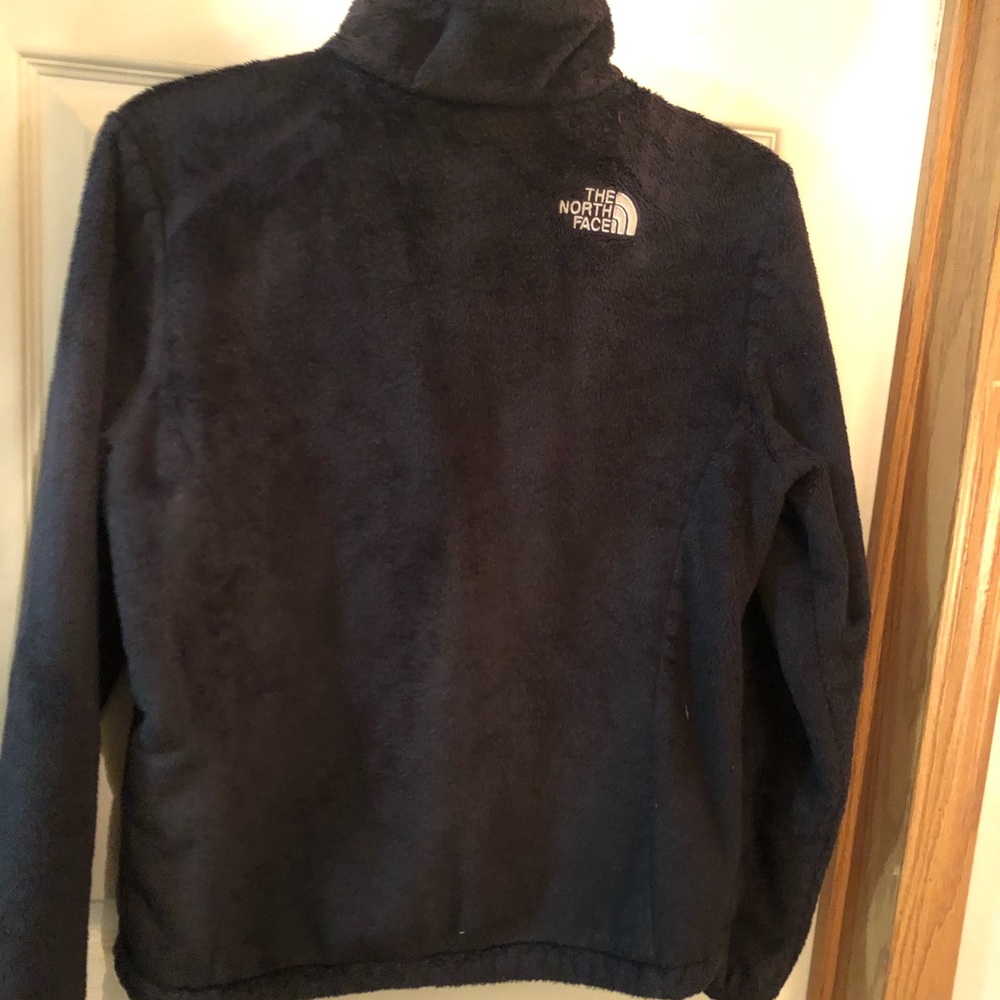 Black fuzzy north face jacket